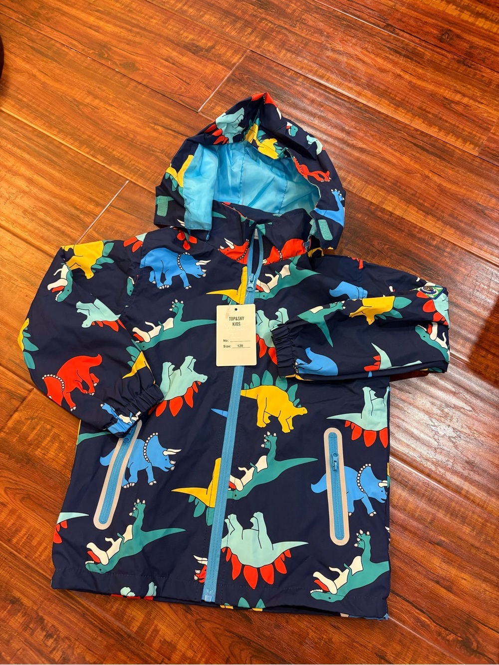 NWT Boys Dinosaur rain jacket 120cm - age 5-7 yrs